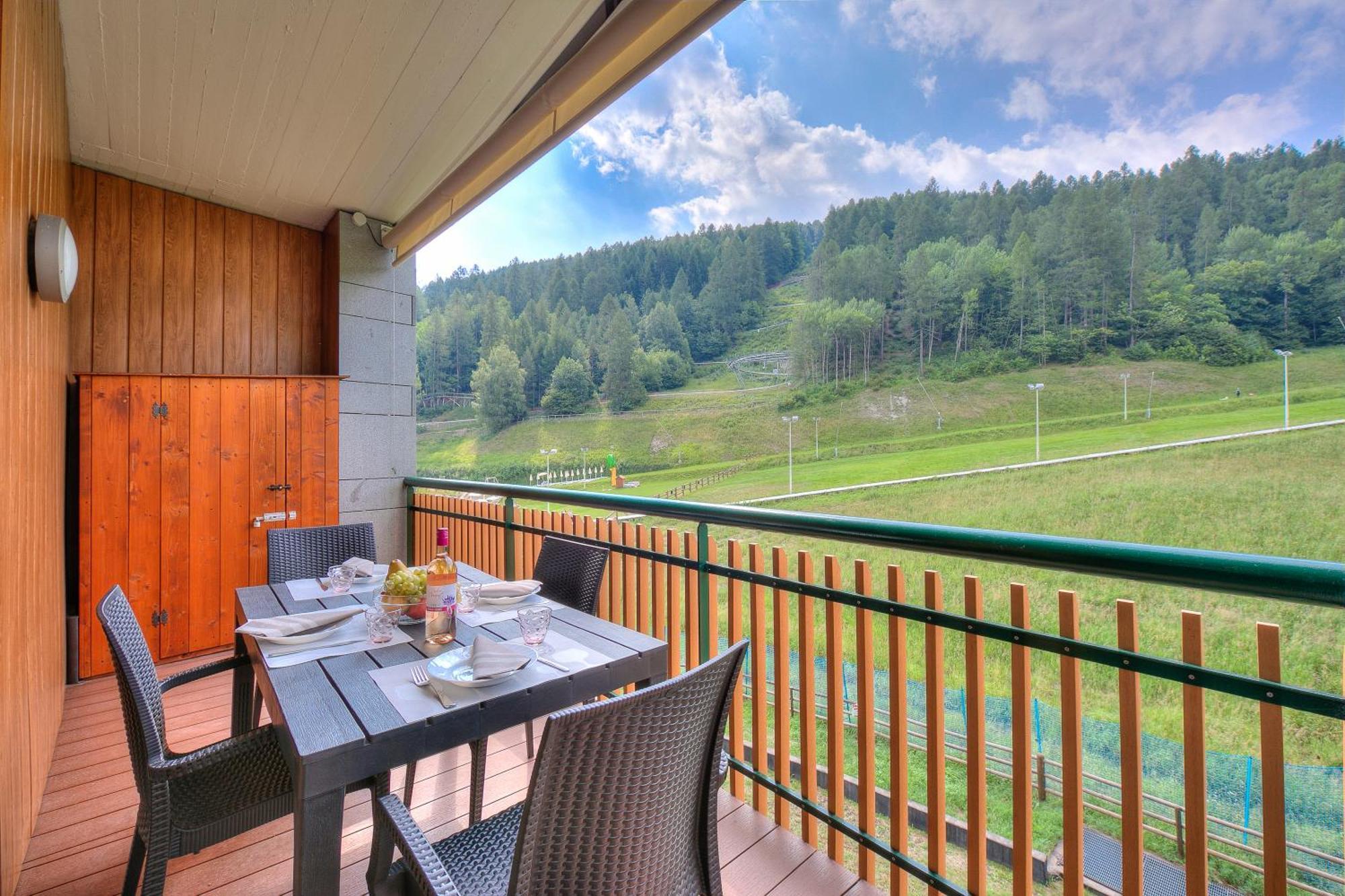 La Marmotta Campo Smith On The Ski Slopes - Happy Rentals 巴多尼奇亚 外观 照片